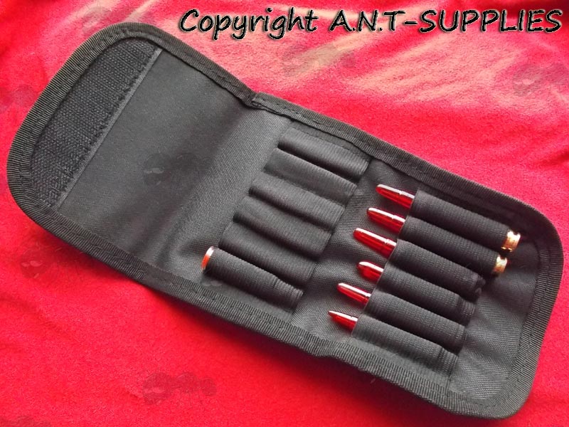 Open View of The Black Canvas Rifle Cartridge Wallet with Range of Red Polymer Snap Caps