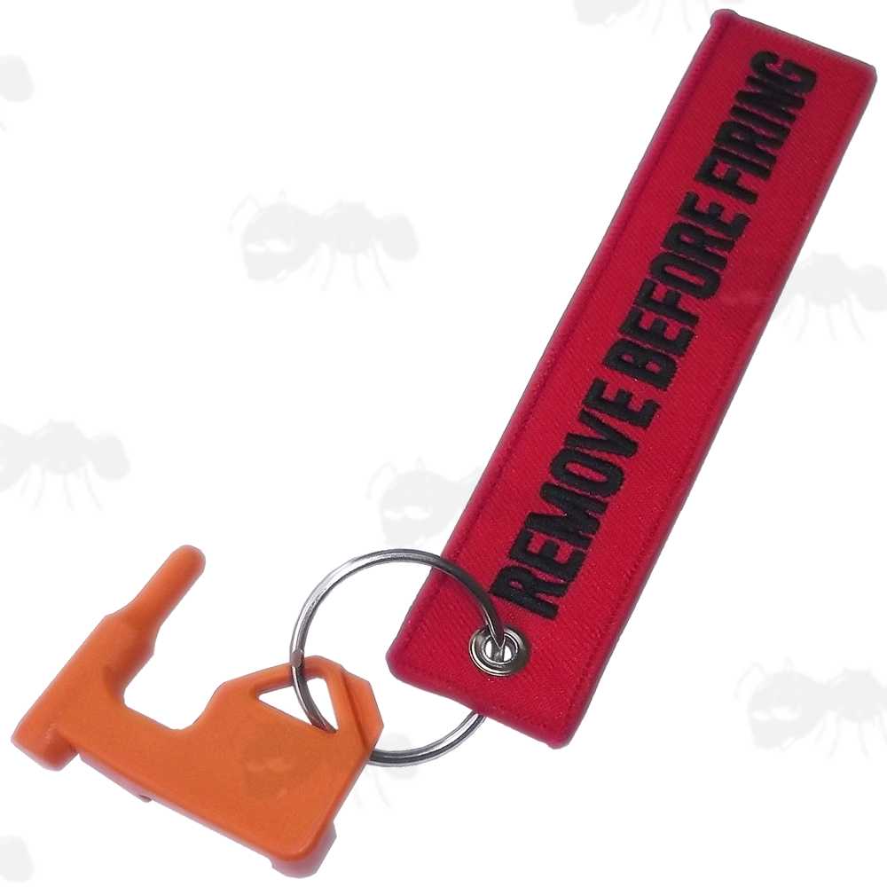 Orange Plastic Empty Gun Chamber Safety Plug Tool with Red Canvas Flag Keychain with Black Embroidered Remove Before Firing Text