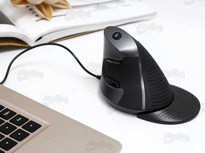 Wired Vertical Grip Optical Computer Mouse with Optional Wrist Support, Shown Connected to a Laptop