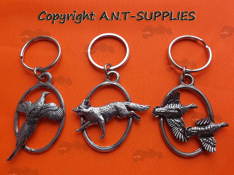 Three English Made Pewter Pheasant, Leaping Fox and Partridges In Flight Keyrings