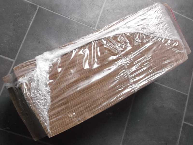 Side View of The Shrink Wrapped Pack of Flat-Packed Brown Cardboard 5 Inch Square Pizza / Side Order Boxes with Integral Lids
