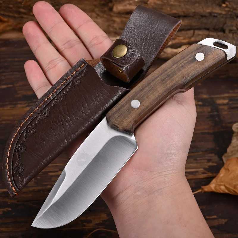 Classic Bushcraft Fixed Blade Full Tang Knife with Dark Brown Sandalwood Scales and Dark Brown Faux Leather Belt Sheath, Shown in Hand