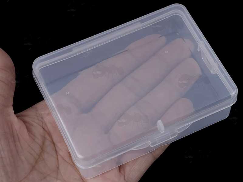 Closed View of The One Compartment Clear Storage Case for Most Sizes of Gun Barrel Cleaning Swabs, Shown in Hand