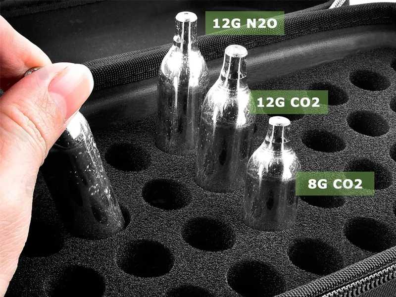 View of a 12g N2O, a 12g CO2 and a 8g CO2 Capsule in The CO2 Black Soft Canvas Storage Case