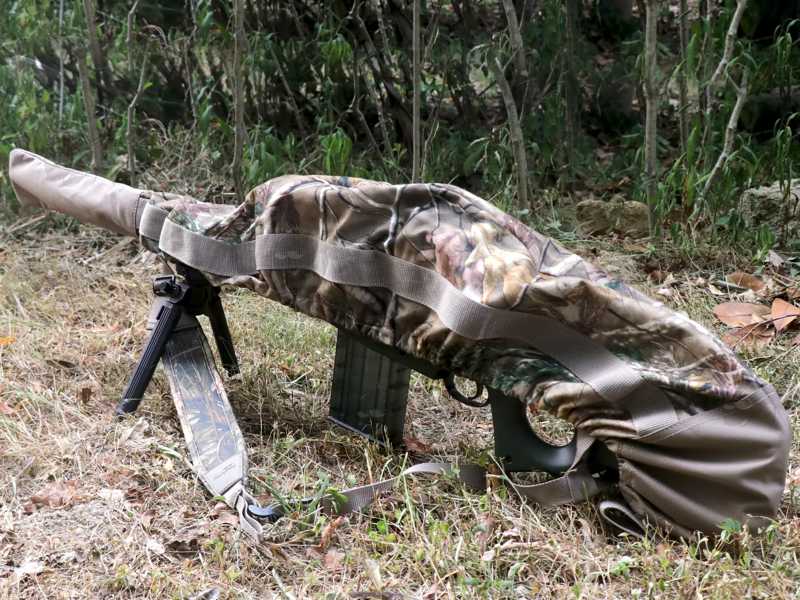 Elasticated Rim Tree Camouflage Patterned Rifle Cover Slip Hood, Shown Over Rifle with Sling and Bipod Fitted