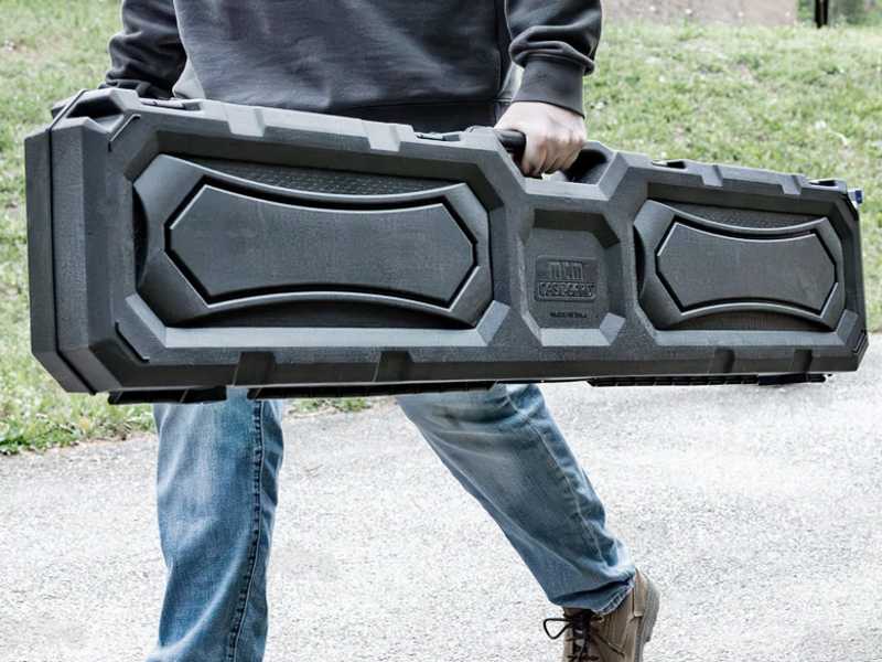 MTM CASE-GARD Model RC51 Hard Plastic Rifle with Scope or Shotgun Carry Case Being Carried