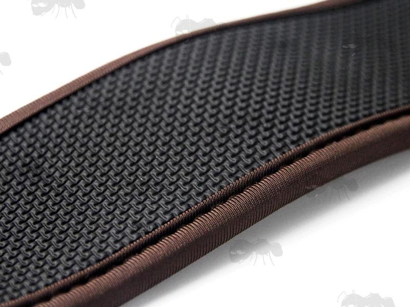 Close Up View of The Rubberised Padding On The Brown Canvas Hunters Sling with Sewn-In Black QD Swivels