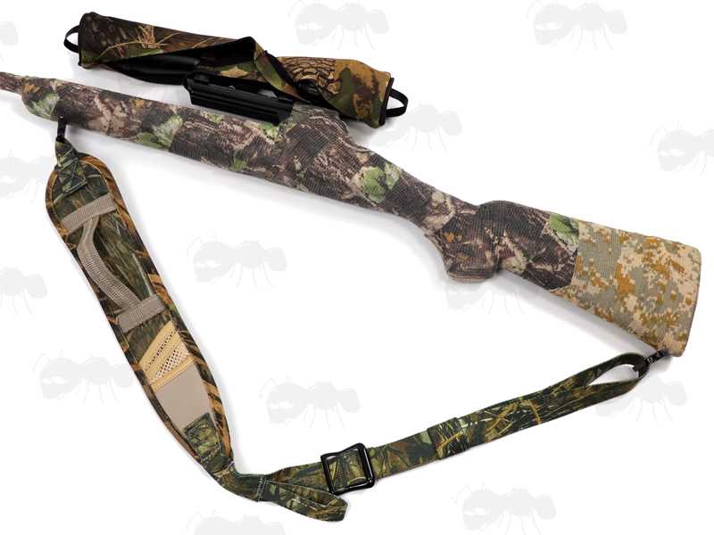 All Reed Camouflage Pattern Shotgun Sling with Mesh Pocket and Hand Grip Handle, Fitted with AnTac QD Stud Fitting Swivels, Shown Attached to a Camo Covered Rifle