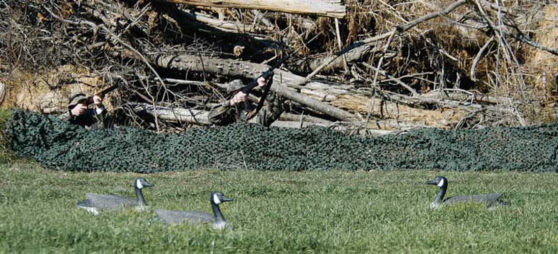 Camo Systems Ultralite Reversible Green and Brown Camouflage Netting In Use In The Field