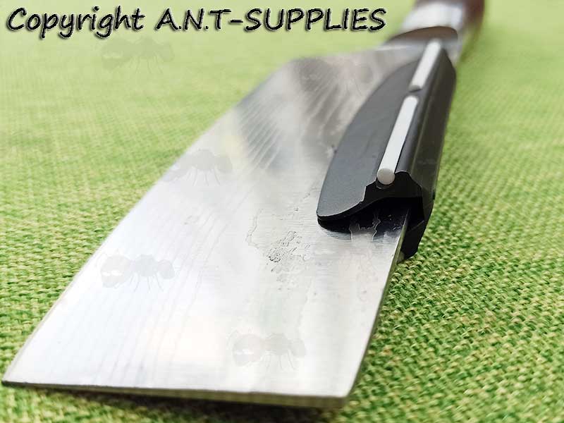 Black Plastic Knife Blade Sharpening in Use on Sharpening Stone