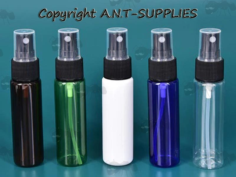 Set of Four Empty Plastic Gun Oil Spray Bottles in Assorted Colours