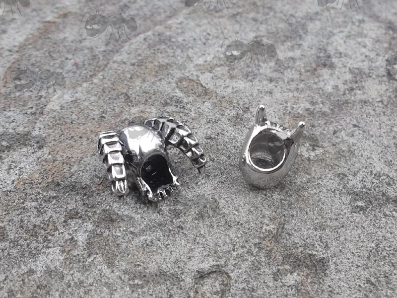 Rear View of a Large and Small Demon Skull Beads with Horns