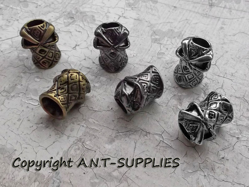 Pair of Silver, Black and Bronze Coloured Hooded Ninja Metal Skull Paracord Beads with Vertical Holes