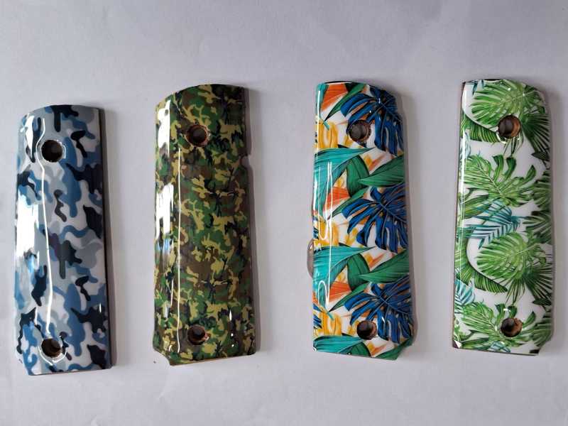 Four Full Size Wood 1911 Pistol Grips with Colourful Designs and Varnished Finishes