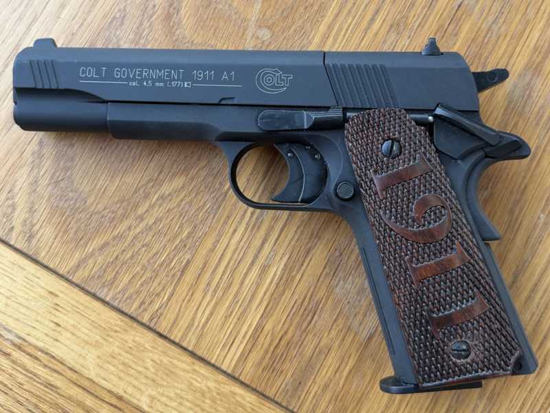 Left-Side Full Size Wood 1911 Pistol Grip with Ornate Decorative Finish, Shown fitted to a Umarex Colt 1911 Air Pistol