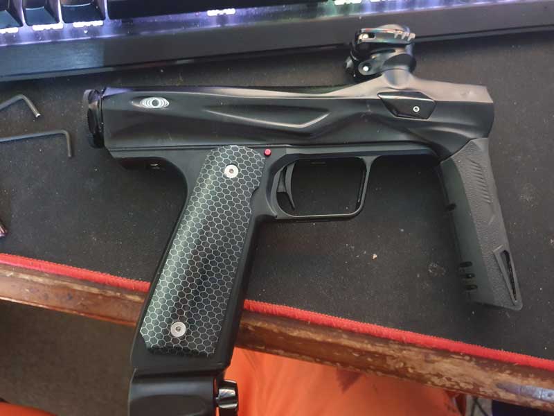 Pair of Full Size Black with Silver Honeycomb Style Resin Grips Fitted to A Shocker Amp Mechanical Paintball Marker