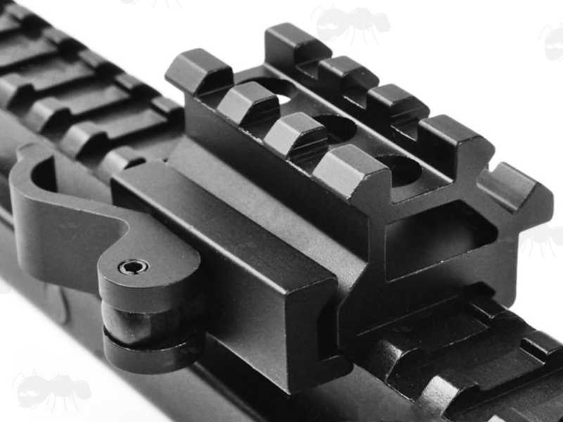 Quick-Release Throw-Lever Weaver Rail Mount with Top and Offset Rails, Shown Mounted to a Rifle Riser Rifle