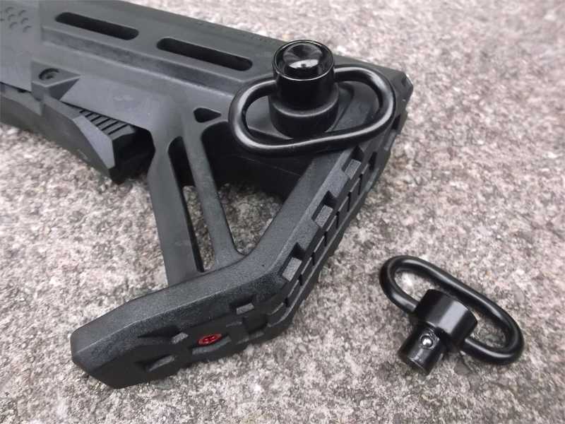 Black M4 Style Collapsible Tactical Rifle Buttstock, Shown with Sling Swivel Fitted to The Red 10mm Push Button Flush Fit QD Socket