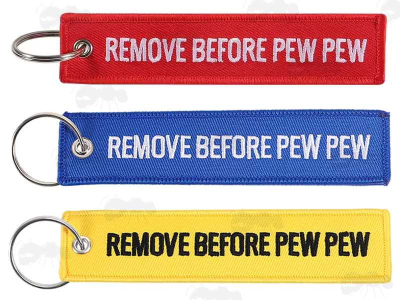 Red, Blue and Yellow Gun Safety Keyrings with Embroidered Thread Remove Before Pew Pew Text