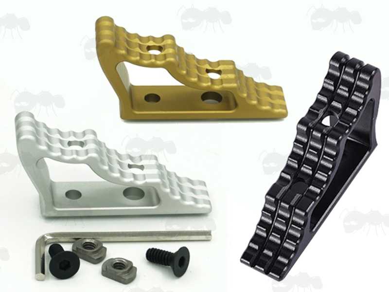 A Black, Silver and Gold Coloured Aluminium Wedge Shaped Handstop for M-Lok Rifle Handguard Accessory Rails