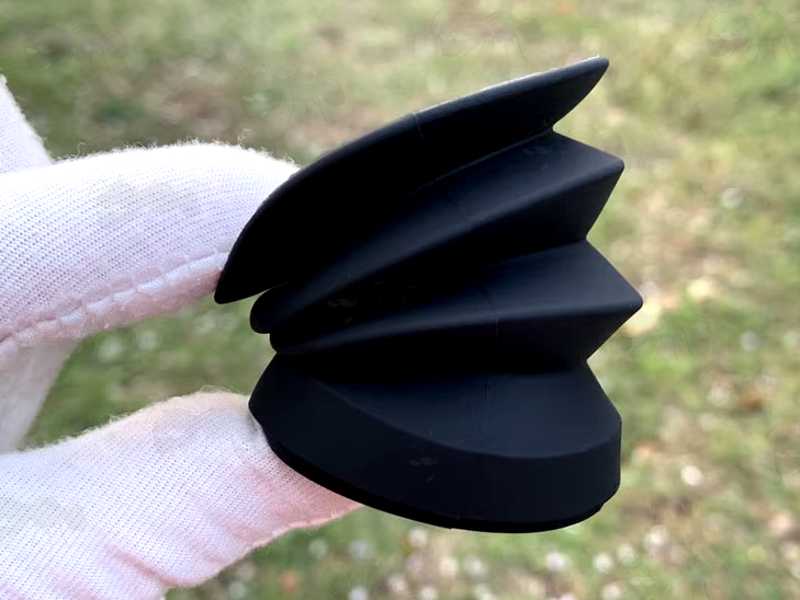 Night Vision Scope Black Rubber Concertina Eyepiece with 35mm to 40mm Diameter Fitting, Shown Being Compressed in a White Gloved Hand