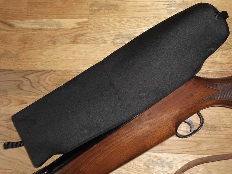 All Black Extra Large Neoprene Rifle Scope Cover Shown Fitted Over a Rifles Scope