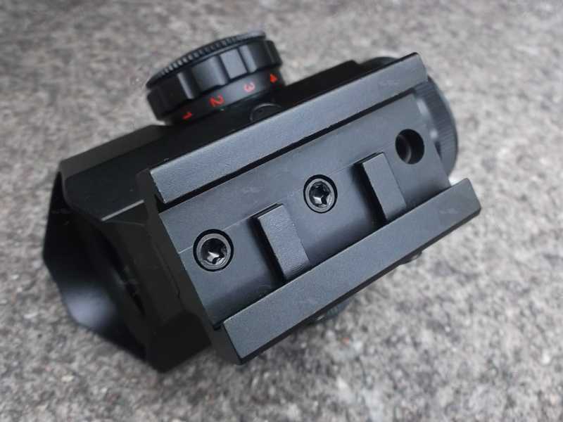 Base Rail Mount Fitting View of The Angular Design 1x20 Prism Red and Green Dot Sight, Showing The Two Location Bars