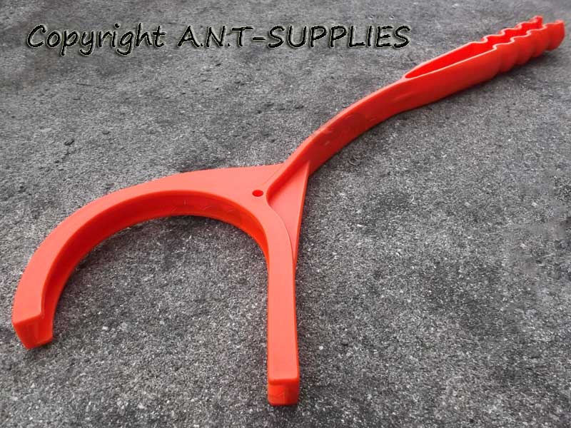 Bright Orange Polymer Hand Held Clay Pigeon Thrower Loaded