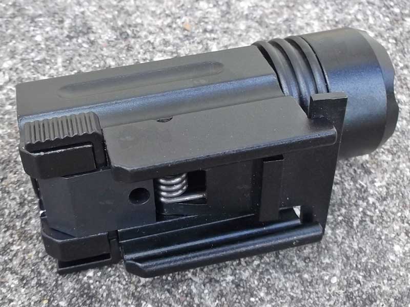 Base Quick-Fitting Lever Lock on The Black Aluminium Body Compact LED Tactical Torch Unit