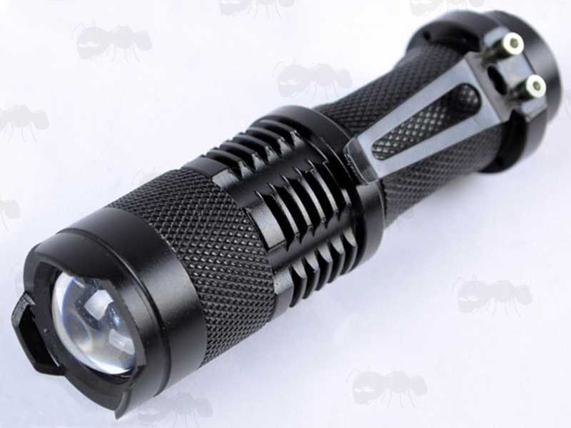 All Black Anodised Metal LED Torch Powered by AA Alkaline or 14500 Lithium-Ion Battery, with Adjustable Zoom, Belt Clip and Orange Tailcap Power Button