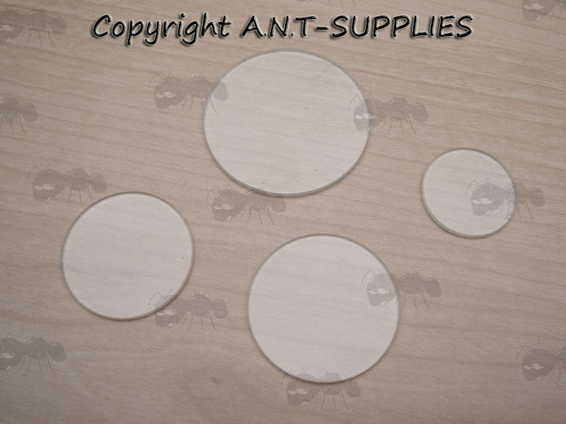 Four Small Clear Glass Torch Lenses